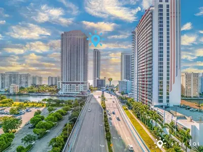 a city skyline with tall buildings and a road at Stylish Apt - Beach View - Resort Access in Hollywood
