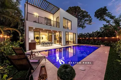 an image of a house with a swimming pool at Villa Enclave- Brand New Luxe Las Olas Beach Villa in Fort Lauderdale