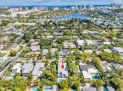 an aerial view of a suburb with a red arrow at Villa Enclave- Brand New Luxe Las Olas Beach Villa in Fort Lauderdale
