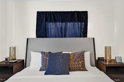 a bedroom with a bed with two nightstands and a bed sidx sidx sidx at Penthouse EDEN 2BR with ocean view in Fort Lauderdale