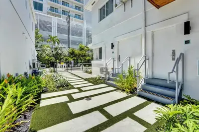 a walkway in front of a building at Penthouse EDEN 2BR with ocean view in Fort Lauderdale