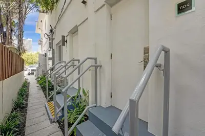a group of stairs next to a building at Eden Escape Walk to FLT Beach 1104 in Fort Lauderdale
