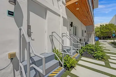 a group of stairs leading up to a building at Eden Escape Walk to FLT Beach 1103 in Fort Lauderdale