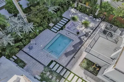 an overhead view of a swimming pool in a backyard at Eden Escape Walk to FLT Beach 1105 in Fort Lauderdale