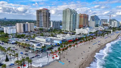 an aerial view of a beach with buildings and the ocean at Banyan St 2BR 1BA off Las Olas Steps to Beach 1 in Fort Lauderdale