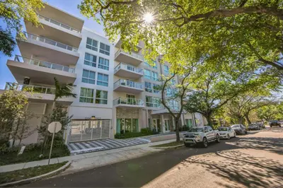 an apartment building on a street with parked cars at Lux 2BR City-View Retreat in Hollywood, 2nd Floor in Hollywood