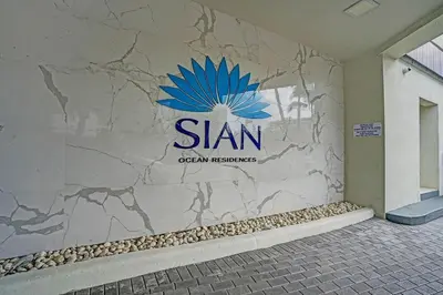 a building with a sign on the side of it at Luxury Oceanfront 2 Bedroom ON THE BEACH 3 FLOOR in Hollywood