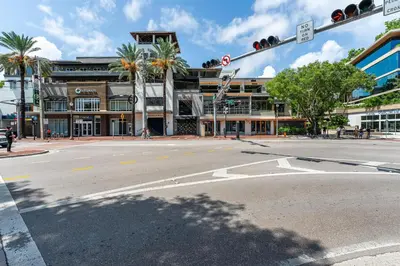an empty street with a traffic light in front of a building at Breathtaking Direct Bay Views 2 bedroom condo with parking in Miami