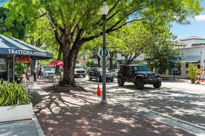 a jeep parked on the side of a street at Coconut Grove Bayview unit Parking Included in Miami