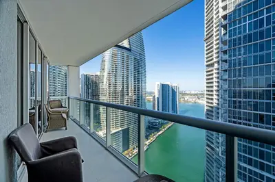 a balcony with a view of the water in a city at Icon brickell The W hotel residence in Miami