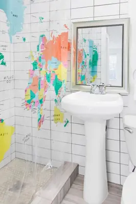 a bathroom with a sink and a map on the wall at Miami Designer Apartment Unit 1 in Miami