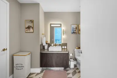 a bathroom with a sink and a mirror at Hotel 601 in Miami