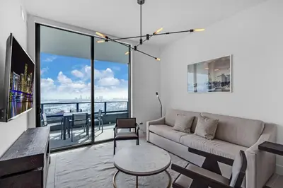 a living room with a couch and a table at Hotel 601 in Miami