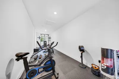 a gym with a exercise bike in a room at Chic 1-BD Apt in Miami Gym, BBQ, Free Parking in Miami