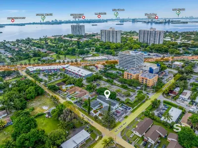 an aerial view of a city with buildings and a river at Sleek 1-BD Miami Apt Gym, BBQ, Free Parking in Miami
