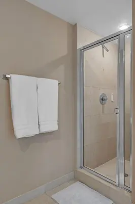 a bathroom with a shower with a towel at Moderne 2 bed 2 bath Residence in Miami