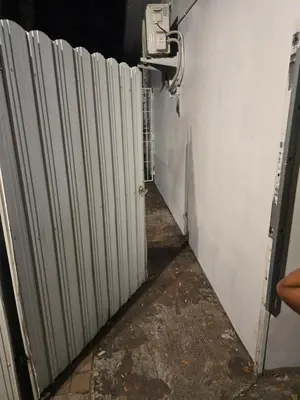 a hallway with a row of radiators at Land of the free in Miami