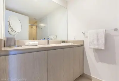 a bathroom with a sink and a mirror at LYFE, Rent Excelent Apartment in Resort, 4Pax ,Parcial Ocean View in Hollywood