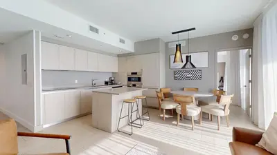 a kitchen and dining room with a table and chairs at Hyde Beach House 3BR2BA in Hollywood
