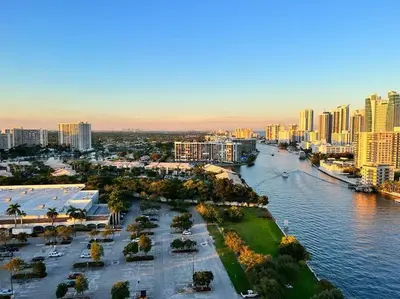 an aerial view of a city with a river and buildings at Miami Beach Apartment with piscina and gym in Hallandale Beach