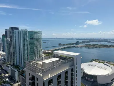 an aerial view of a city with a body of water at Sky-High Views Pool – Steps from Miami Arena in Miami