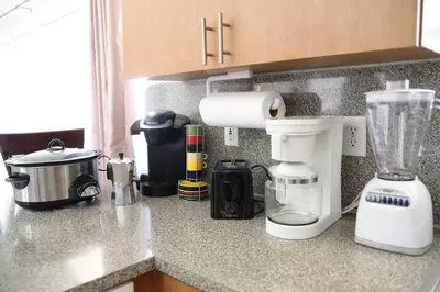 a kitchen counter with a blender on a counter top at Luxury DreamStay Miami 3BED 2BATH King Suite in Burrs Strip