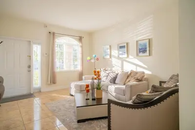 a living room with a couch and a table at Luxury DreamStay Miami 3BED 2BATH King Suite in Burrs Strip