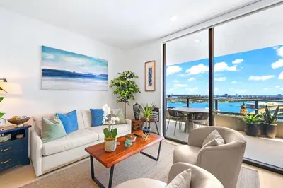 a living room with a couch and a table at Enjoy Miami From a Condo on 24th Floor in Miami