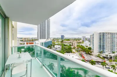 a balcony with a view of the city at Hollywood Beachfront Retreat in Hollywood
