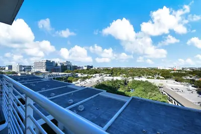 a view of a city from a balcony at Exclusive unit in Miami Sunshine in Miami