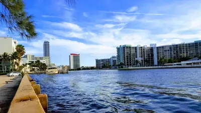 a river in the middle of a city with buildings at Hollywood Beach, 10th floor, on the beach 10T in Hollywood