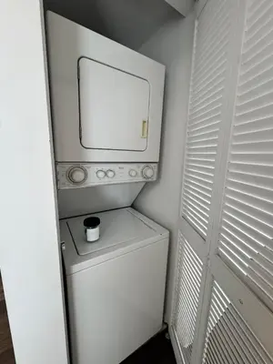 a white washer and dryer in a small room at Brickell 2 bedroom condo in the heart of Miami in Miami
