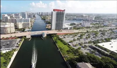 an aerial view of a city with a river and a bridge at 2b 2b Beautiful Apmt in Hallandale Beach with beach service in Hallandale Beach