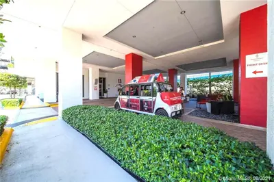 a food truck parked inside of a building at Steps from the beach 2B 2B Pool, Gym, and More in Hallandale Beach