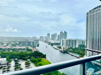 a view of a river in a city with buildings at Steps from the beach 2B 2B Pool, Gym, and More in Hallandale Beach