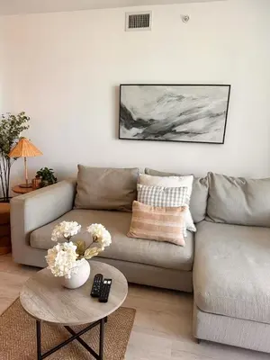 a living room with a couch and a table at Miami Beach 1B 1B w Kitchen and Beach Service in Hallandale Beach
