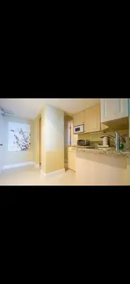 a kitchen with a sink and a counter top at Castle beach studio,tennis court and swimming pool with beach access in Miami Beach