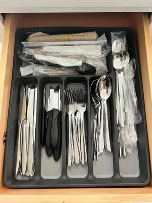 a black tray with utensils in a drawer at Fully Equipped Modern Loft in the heart of Miami in Miami