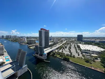 an aerial view of a city with a river and buildings at Beachfront Apt with Gym, Pool, and Rest in Miami in Hollywood