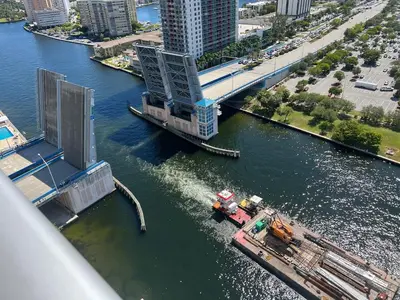 an aerial view of a bridge over a river at Beachfront Apt with Gym, Pool, and Rest in Miami in Hollywood
