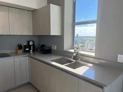 a kitchen with a sink and a window at Best Apartment next to Hollywood Beach 2B 2B in Hollywood