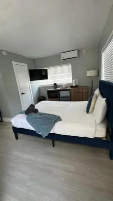 a bedroom with a large bed in a room at Charming 1BR Escape Near Hollywood & Dania in Dania Beach