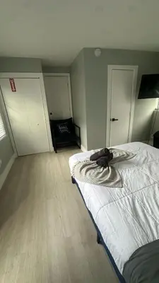 a bedroom with two beds and a bedvisor at Charming 1BR Escape Near Hollywood & Dania in Dania Beach