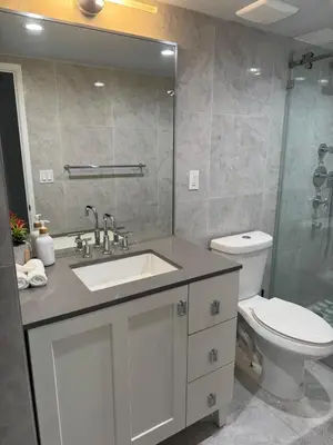 a bathroom with a sink and a toilet at Ocean Reserve Luxury Condo Sunny Isles Beach in Sunny Isles Beach