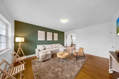 a living room with a couch and a table at Modern 1-BD Apt with Free Parking in Miami Beach