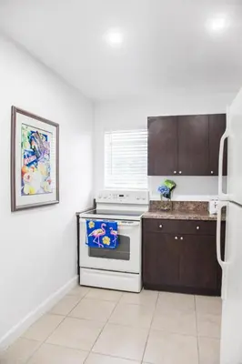 a kitchen with a stove and a refrigerator at Buena Vista-Miami Designer Studio # 1 in Miami
