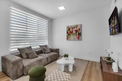 a living room with a couch and a table at #206 Brand-New 2BR- 2BA Near Brickell in Miami