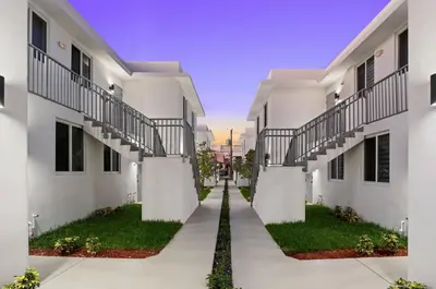 an empty alley between two buildings at #208 Brand New 2BR -2BA near marlins stadium in Miami