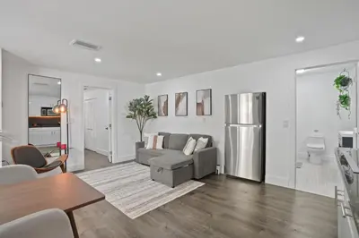 a living room with a couch and a table at Luxury 1 bedroom apt in Kendall Prime Location in Westwood Lake