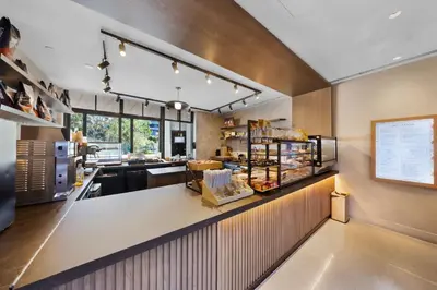 a kitchen with a counter and aasteryasteryasteryasteryasteryasteryasteryasteryastery at Modern Downtown Studio with city views in Miami